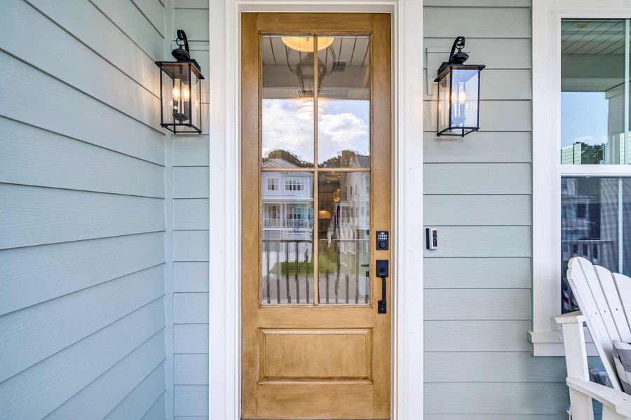 Exterior details and patio area of a home in Overlook at Copahee Sound, Awendaw (Image 29).
