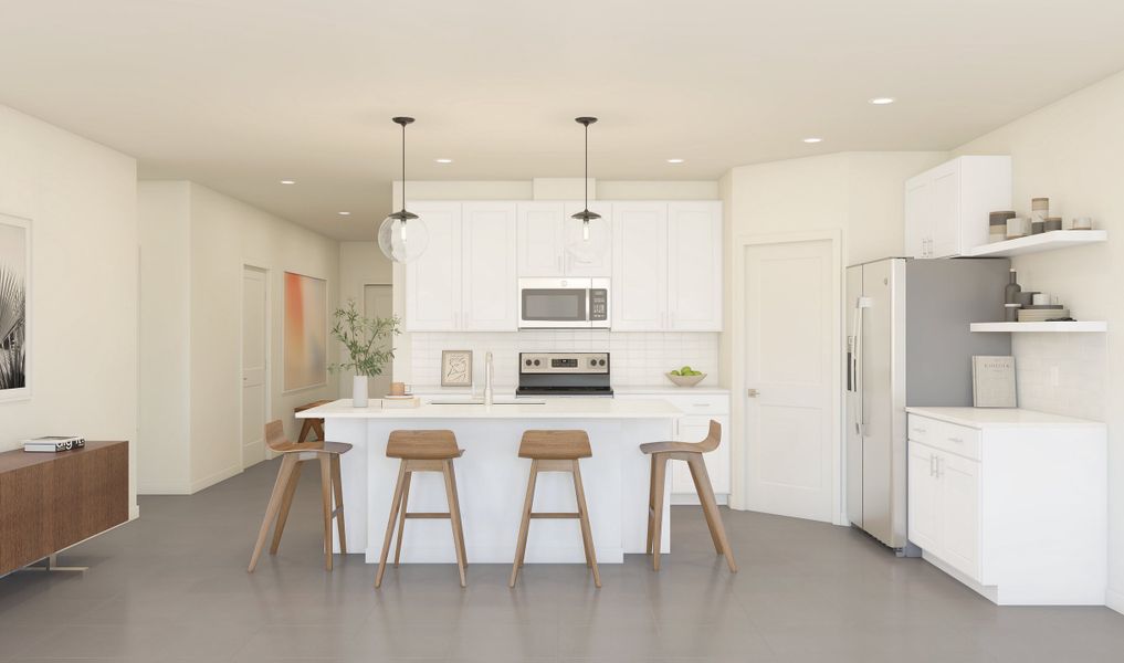 Kitchen with vast island & pendant lights