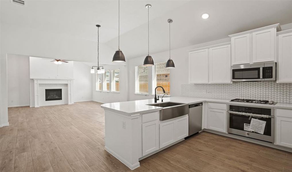 Kitchen overlooks dining area