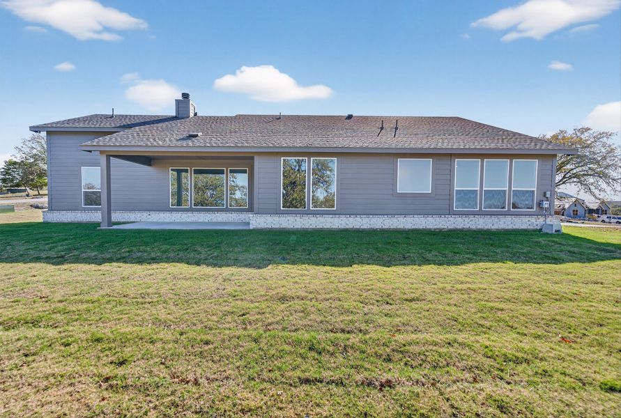 Exterior details and patio area of a home in Oak Grove Addition, Springtown (Image 30).