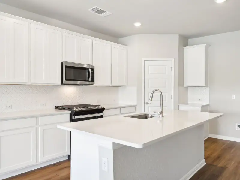 Furnished interior view inside a new home in Big Sky Ranch - Reserve Collection, Dripping Springs (Image 3).