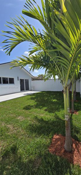 Exterior details and patio area of a home in , Miami (Image 21). Exterior details and patio area of a home in , Miami (Image 21).