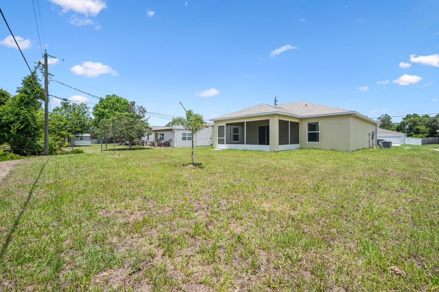 Exterior details and patio area of a home in Palm Bay & South Brevard, Palm Bay (Image 3).