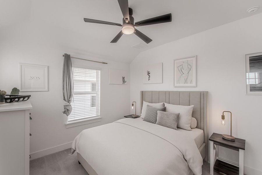 The upstairs guest bedroom features a full en suite bathroom that your guests will love!
