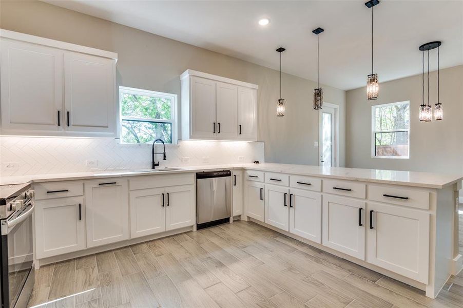 Kitchen with spice drawer, receptible holder and pie pan holder Kitchen with spice drawer, receptible holder and pie pan holder