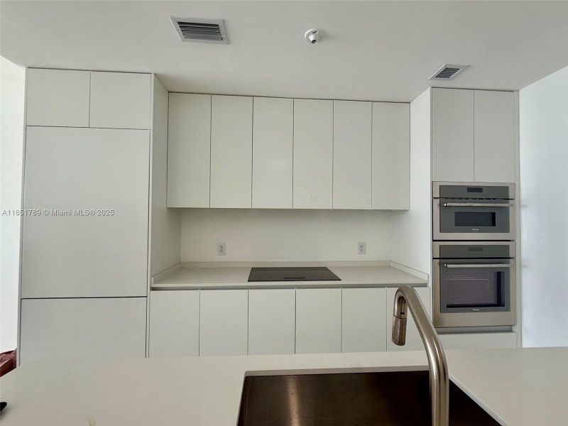 Furnished interior view inside a new home in Aria Reserve, Miami (Image 3).