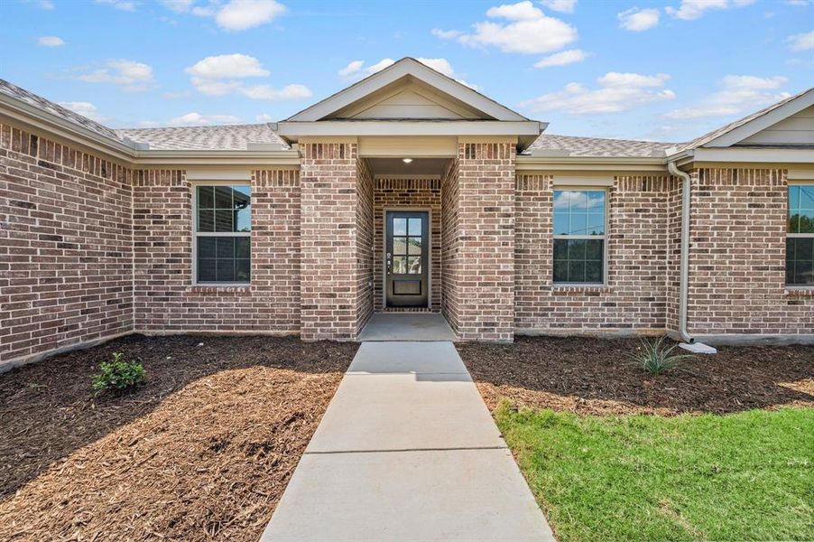 Exterior details and patio area of a home in Runaway Bay, Runaway Bay (Image 25).