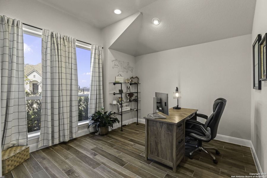Furnished interior view inside a new home in The Village of Mill Creek 50', Seguin (Image 11).