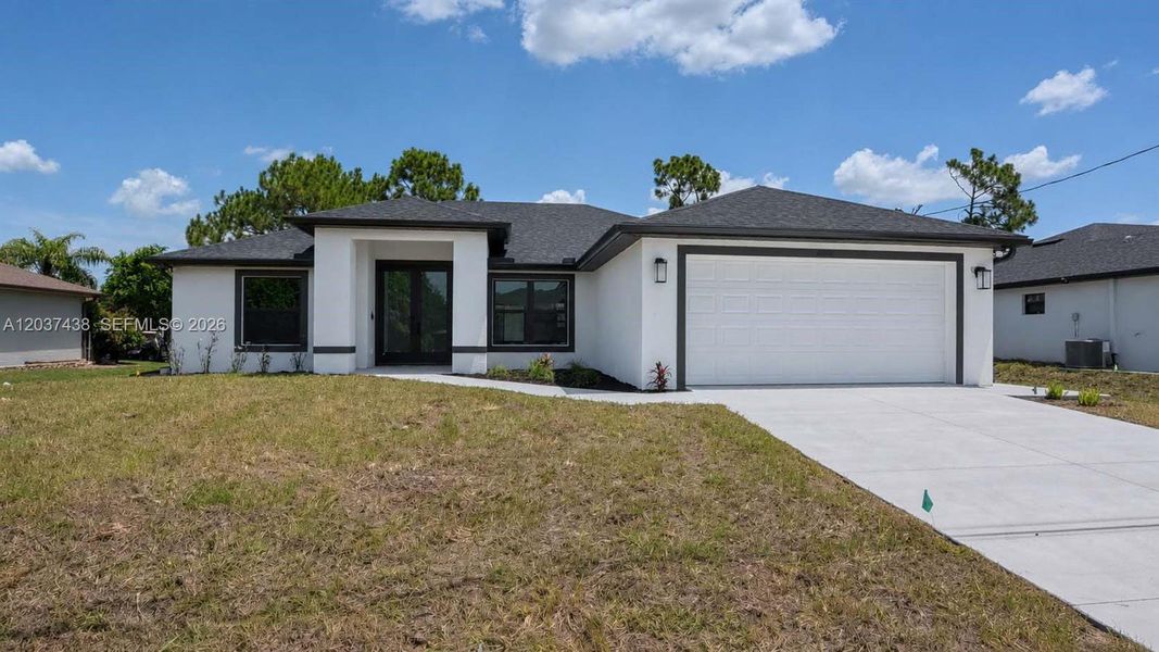 Front exterior of a new home in , Lehigh Acres, FL, highlighting curb appeal (Image 28).