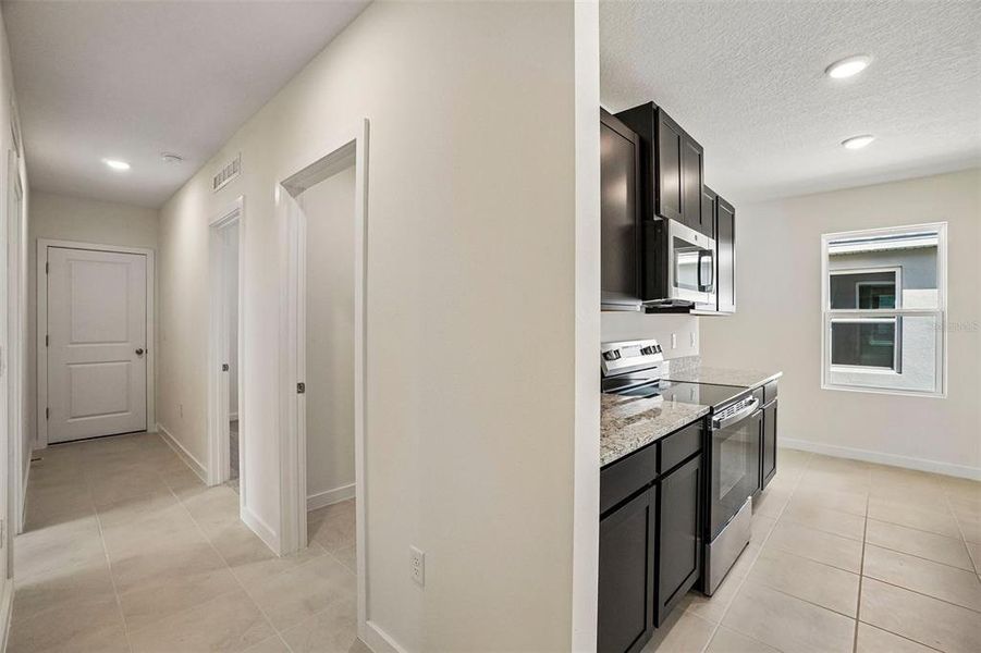 Furnished interior view inside a new home in Willowbrook North, Winter Haven (Image 7). Furnished interior view inside a new home in Willowbrook North, Winter Haven (Image 7).