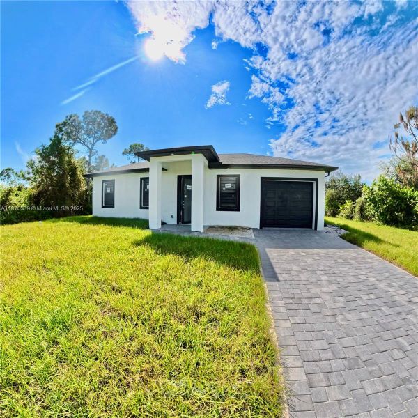 Exterior details and patio area of a home in , Lehigh Acres (Image 23). Exterior details and patio area of a home in , Lehigh Acres (Image 23).