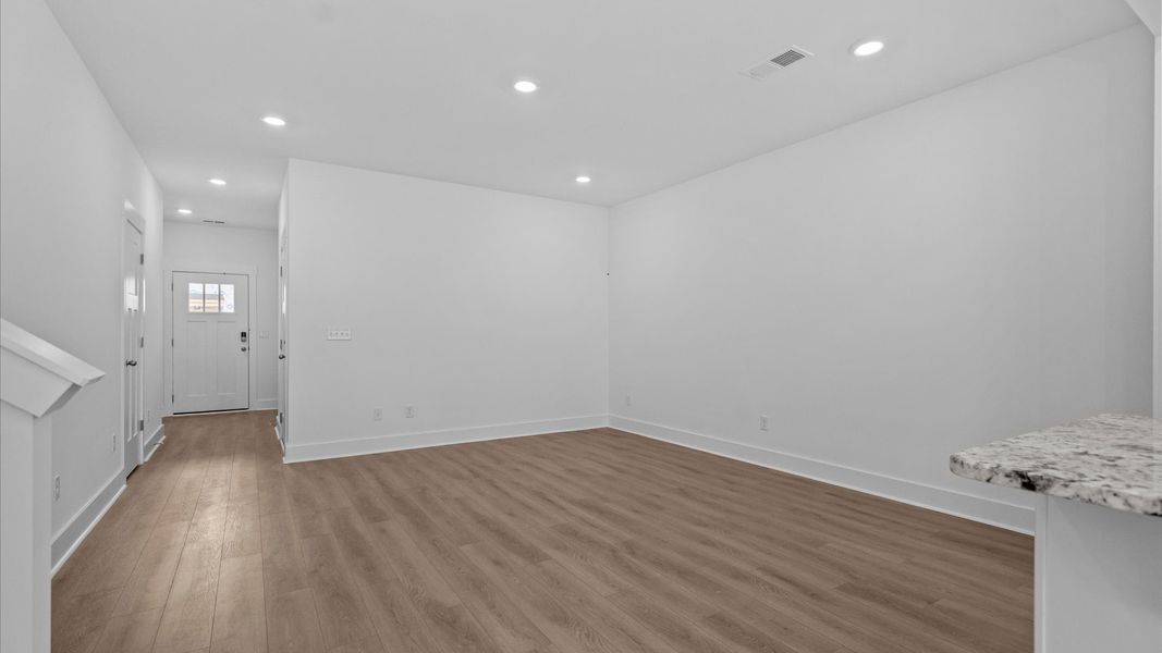 Exceptional family room with hardwood flooring in this exclusive Greenville-area townhome Exceptional family room with hardwood flooring in this exclusive Greenville-area townhome