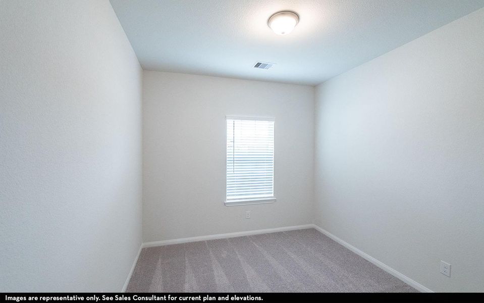 Unfurnished room featuring visible vents, light colored carpet, and baseboards