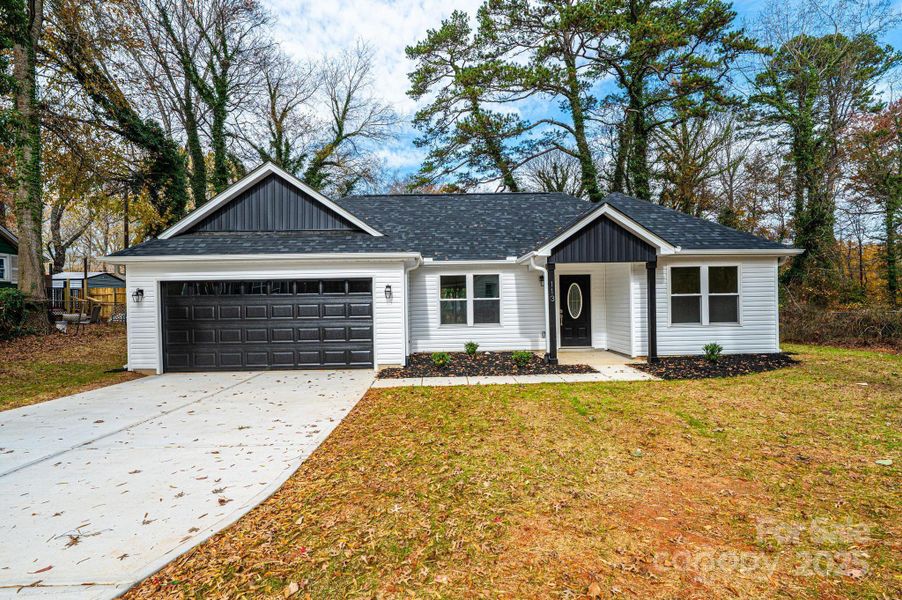 Front exterior of a new home in , Hickory, NC, highlighting curb appeal (Image 13).