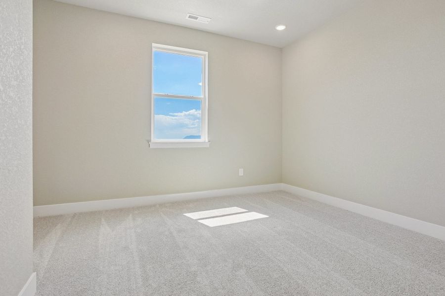 Spacious, unfurnished interior of a new home in Jackson Creek North, Monument (Image 57).