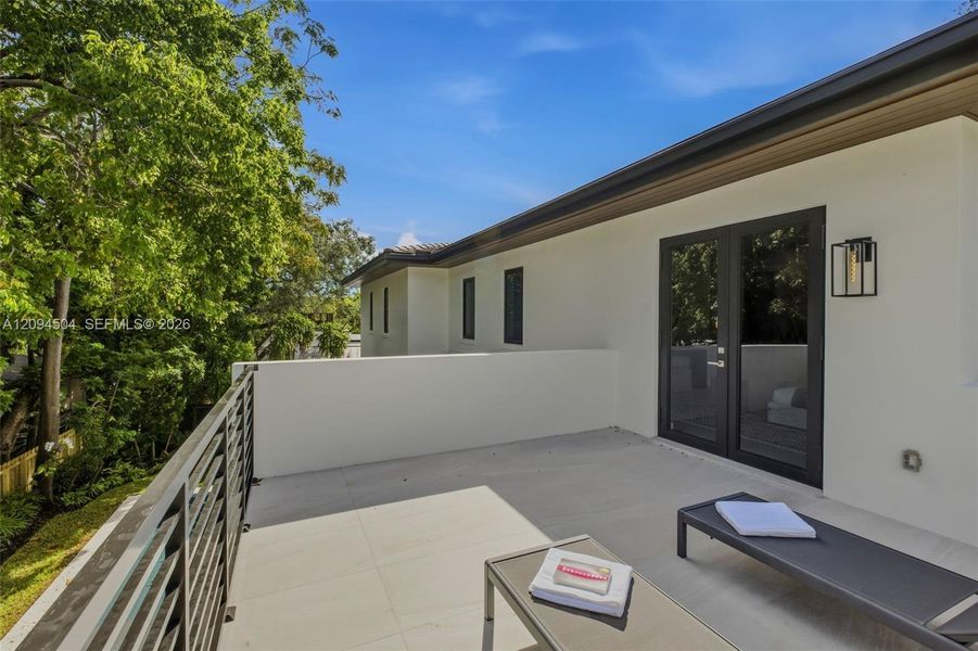 Exterior details and patio area of a home in , South Miami (Image 44).