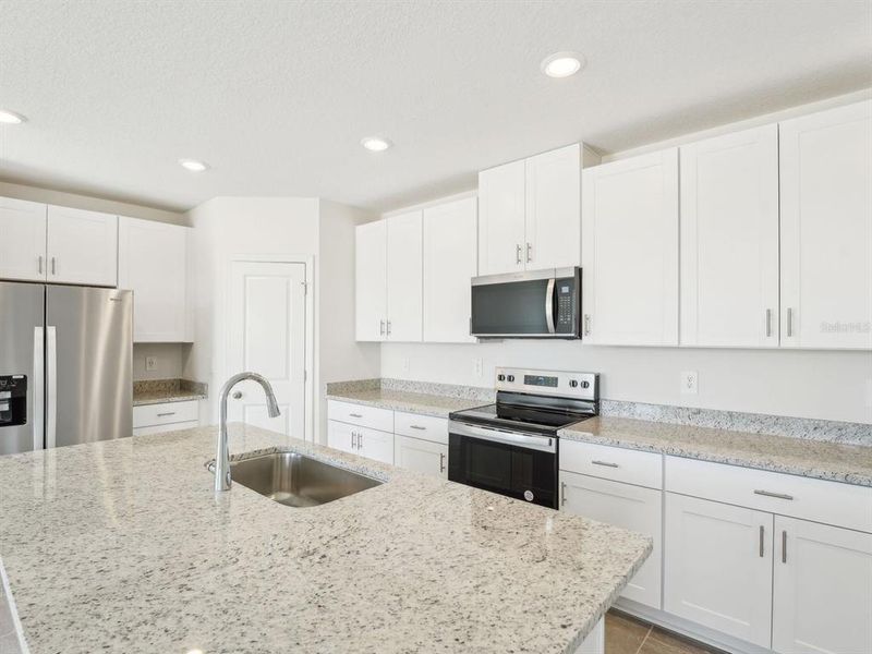 Furnished interior view inside a new home in Benton Hills - Classic Series, Brooksville (Image 5).