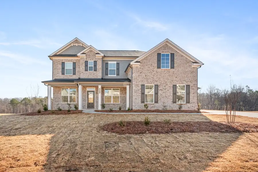 A house with a dirt yard. A house with a dirt yard.