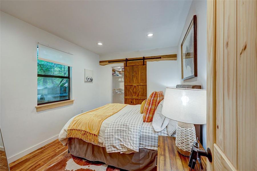 Both secondary bedrooms are across the home from the primary suite offering additional privacy for all. This room featuring a walkin closet with stylish barndoor. 94 San Saba St Austin TX 78702 MLS# 7207900