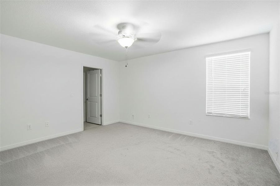 Spacious, unfurnished interior of a new home in The Isle of Avalon, Spring Hill (Image 23).
