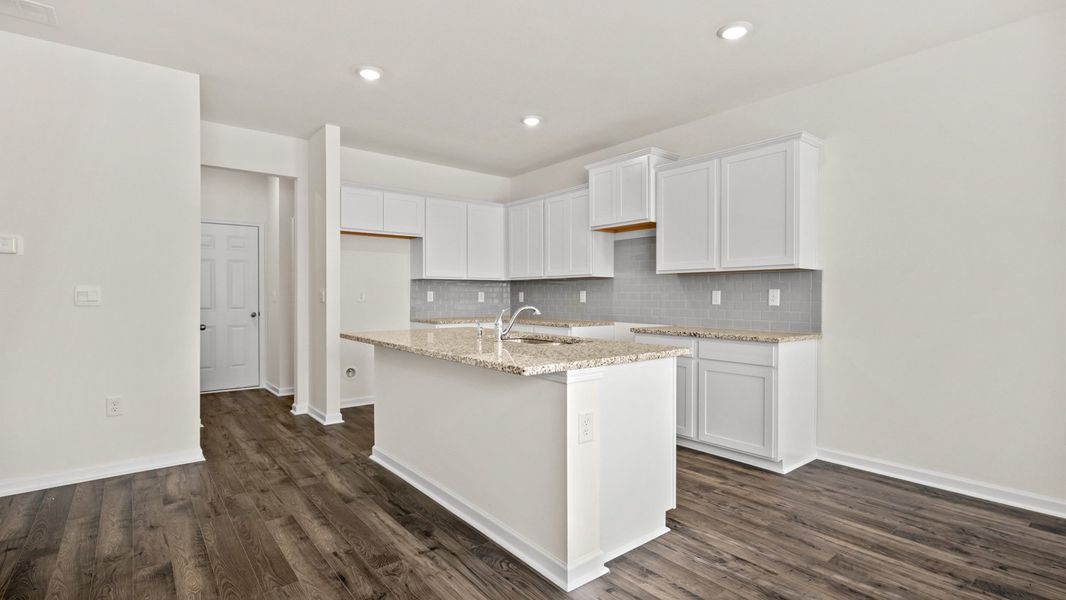 Representative furnished interior of a home built from the Salisbury by D.R. Horton in Inverness at Sugarloaf, Lawrenceville (Image 5).