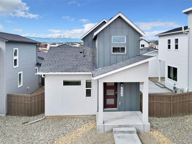 Front exterior of a new home in , Colorado Springs, CO, highlighting curb appeal (Image 21). Front exterior of a new home in , Colorado Springs, CO, highlighting curb appeal (Image 21).