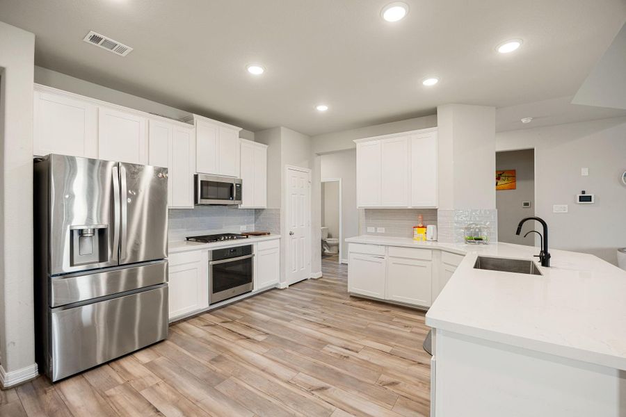 Furnished interior view inside a new home in Sunterra 60ft, Katy (Image 9).