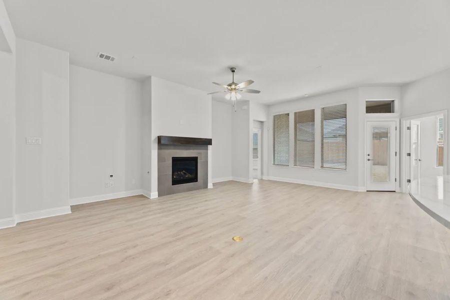 Representative unfurnished interior of a home built from the Bridgeport by Chesmar Homes in Summer Crest, Crowley (Image 6).