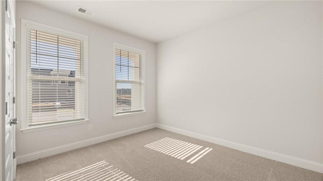 Spacious, unfurnished interior of a new home in Oak Ridge Meadows - Active Adult, Locust Grove (Image 17).