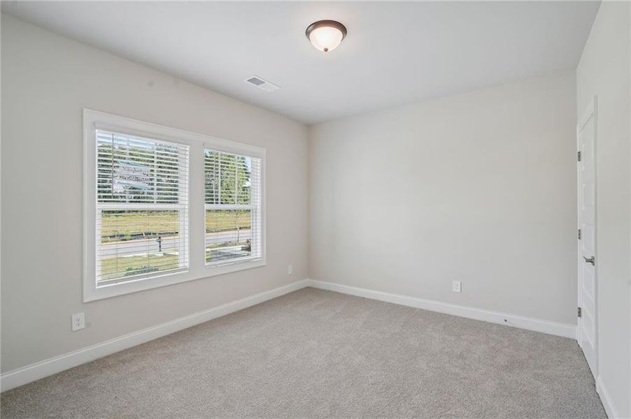Spacious, unfurnished interior of a new home in Hemingway - Highland Series, Cumming (Image 20). Spacious, unfurnished interior of a new home in Hemingway - Highland Series, Cumming (Image 20).