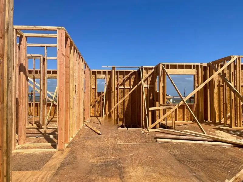 Main-level framing underway — built for durability with 2x6 studs and spray foam insulation. Main-level framing underway — built for durability with 2x6 studs and spray foam insulation.