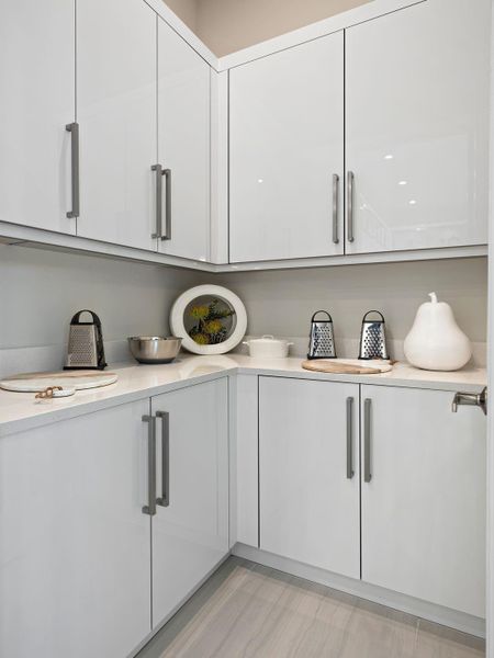 Furnished interior view inside a new home in PGA Village Verano, Port St. Lucie (Image 5).