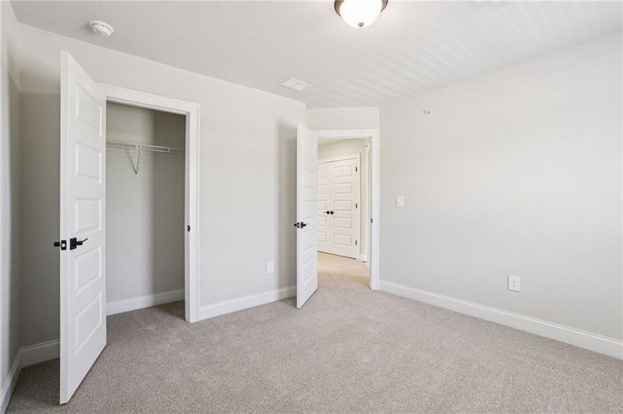 Spacious, unfurnished interior of a new home in Hemingway - Highland Series, Cumming (Image 18). Spacious, unfurnished interior of a new home in Hemingway - Highland Series, Cumming (Image 18).
