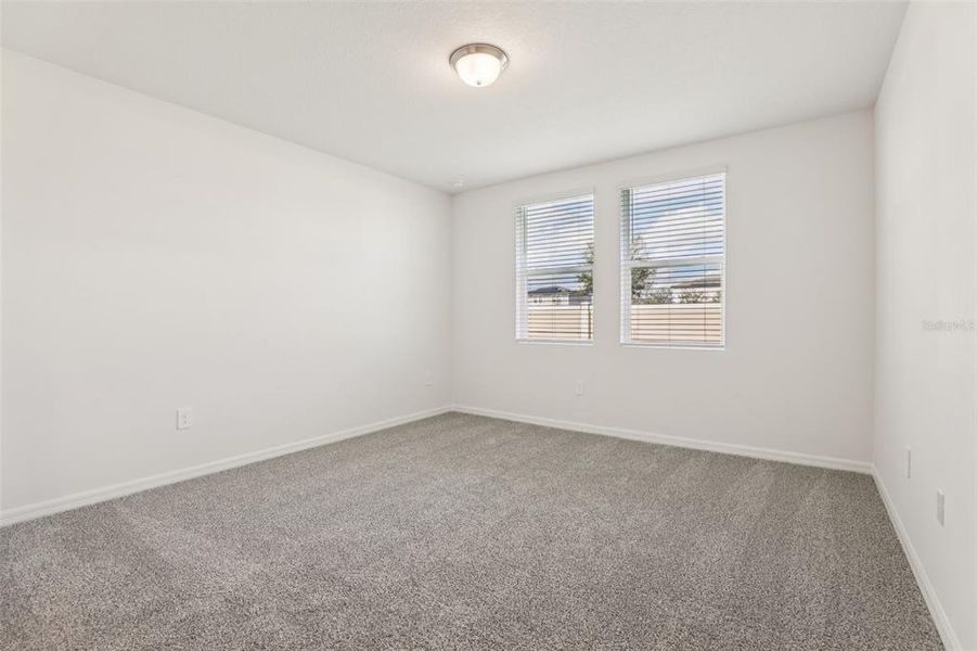 Spacious, unfurnished interior of a new home in Lawson Dunes - Signature Series, Haines City (Image 33).