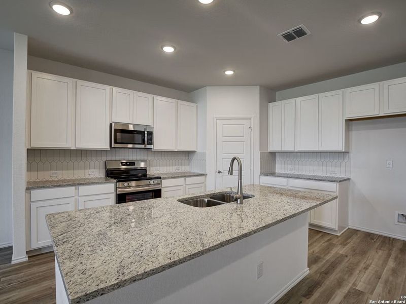 Furnished interior view inside a new home in Hannah Heights, Seguin (Image 6).