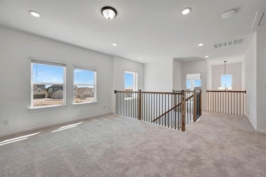 Spacious, unfurnished interior of a new home in Heritage, Dripping Springs (Image 19).