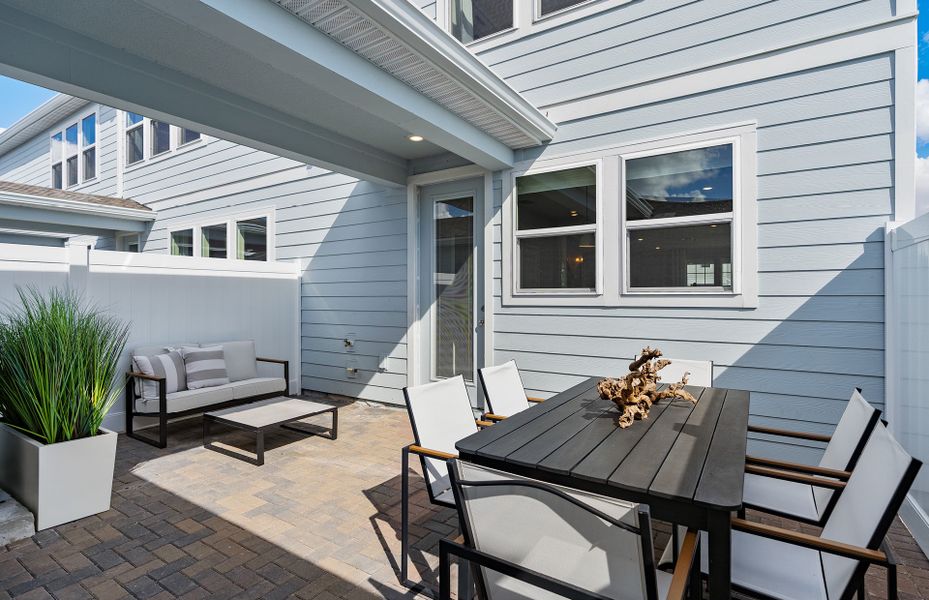 Exterior details and patio area of a home in EverBe, Orlando (Image 3). Exterior details and patio area of a home in EverBe, Orlando (Image 3).