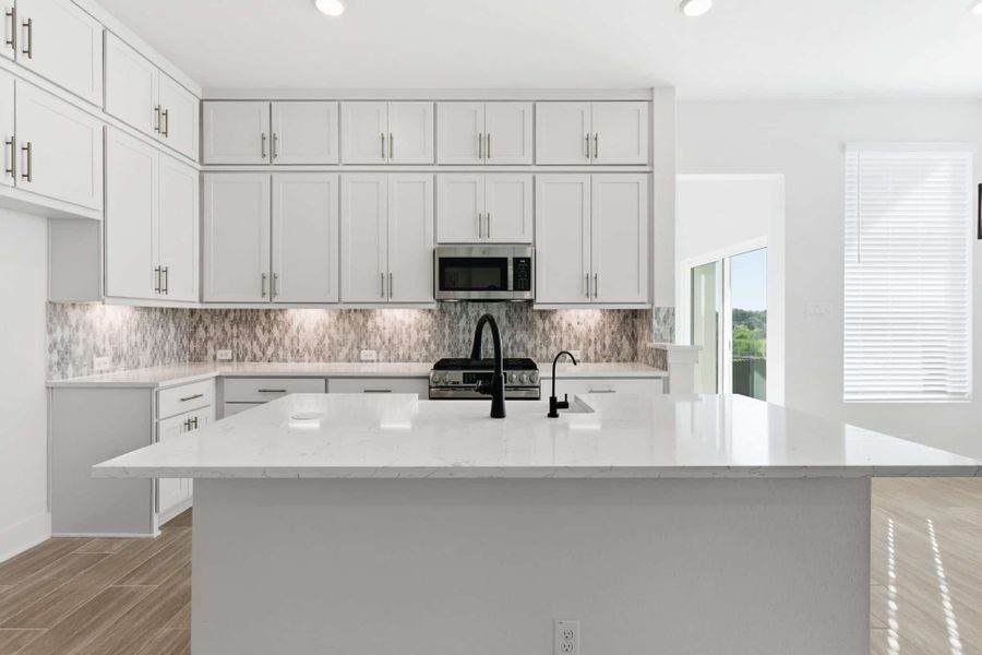 Furnished interior view inside a new home in Centero at Stone Oak, San Antonio (Image 11).