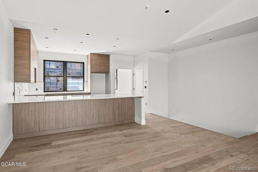 Spacious, unfurnished interior of a new home in , Granby (Image 15).