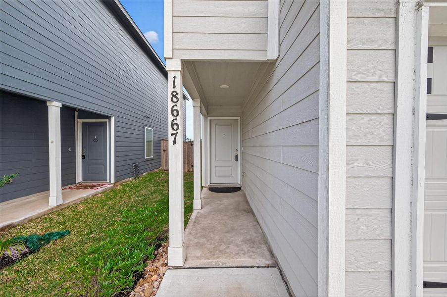 Exterior details and patio area of a home in Tavola, New Caney (Image 4). Exterior details and patio area of a home in Tavola, New Caney (Image 4).