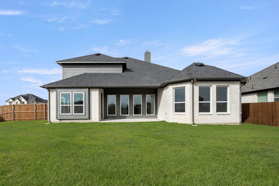 Exterior details and patio area of a home in Hayes Crossing, Midlothian (Image 18).