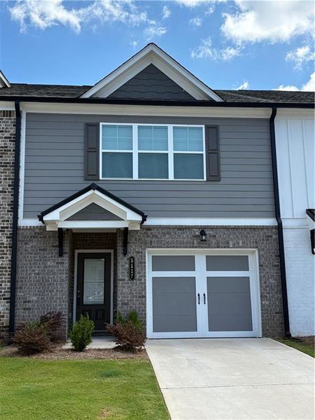 Front exterior of a new home in , Oakwood, GA, highlighting curb appeal (Image 2). Front exterior of a new home in , Oakwood, GA, highlighting curb appeal (Image 2).