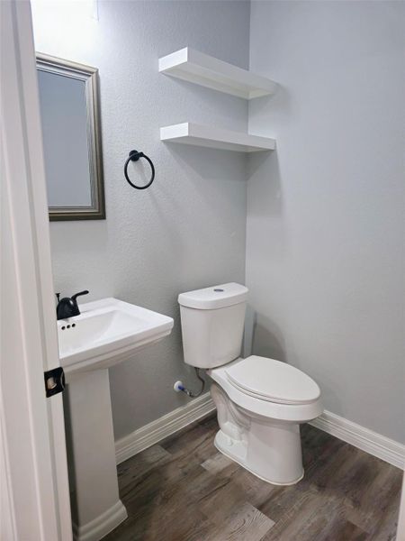 Easy access to half bathroom from everywhere in the house.