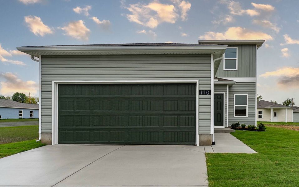 Front exterior of a new home in Stonehenge, Manchester, TN, highlighting curb appeal (Image 1).