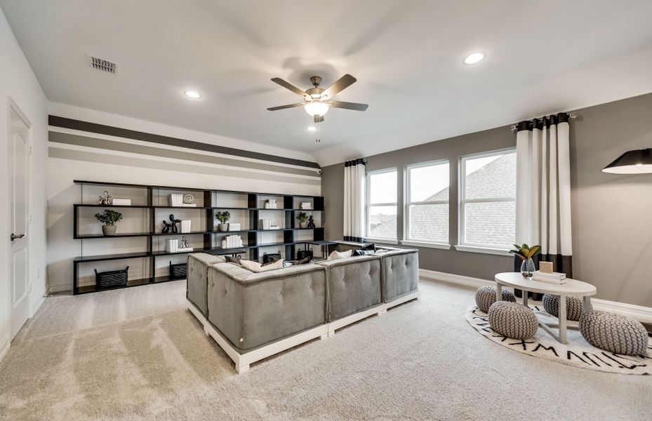 Game room on second floor with large windows