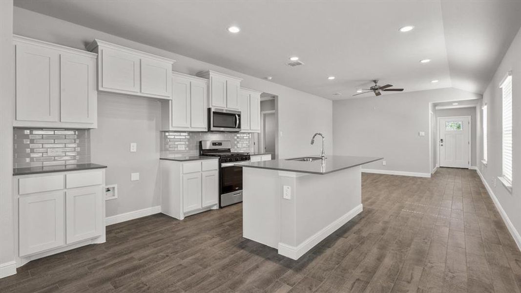 Kitchen- All Home and community information, including pricing, included features, terms, availability and amenities, are subject to change at any time without notice or obligation. All Drawings, pictures, photographs, video, square footages, floor plans, elevations, features, colors and sizes are approximate for illustration purposes only and will vary from the homes as built.