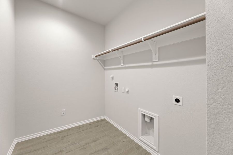 Representative exterior photo of a completed home built from the Phoenix by Impression Homes in Terra Vella, Haslet, TX (Image 22).