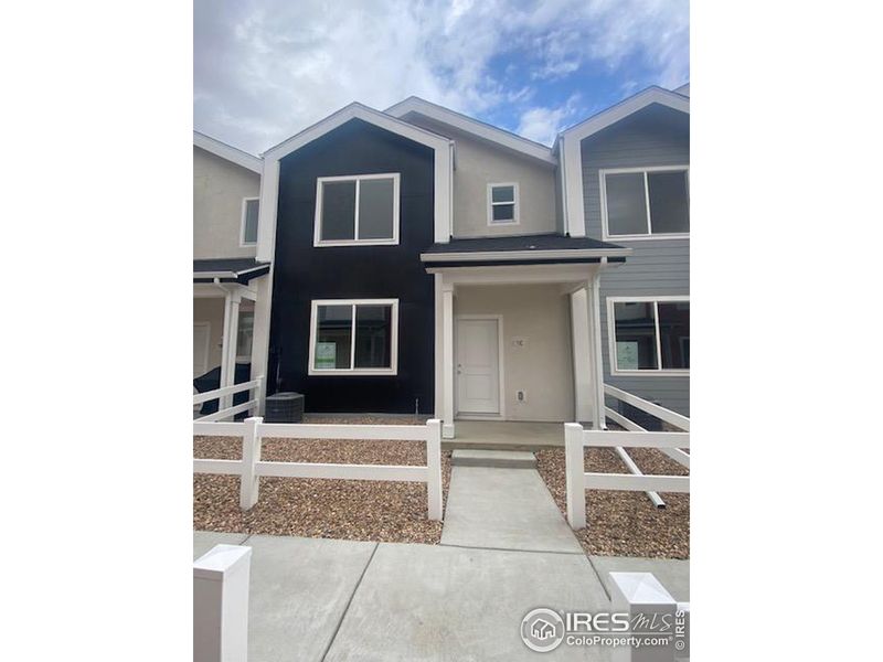 Welcome! Covered patio and inviting front yard