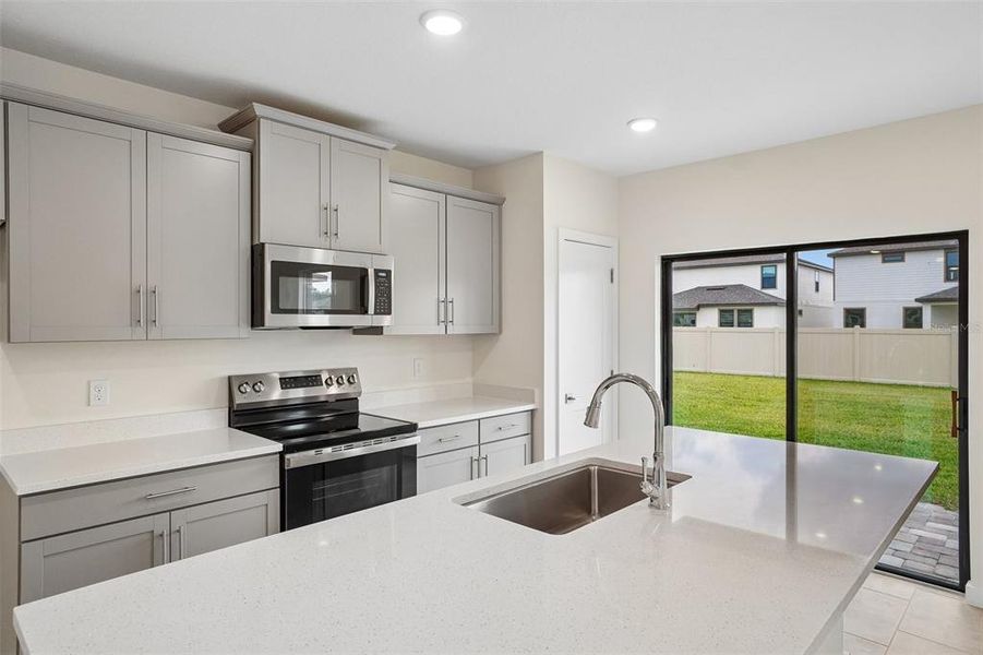 Furnished interior view inside a new home in Grasslands West, Lakeland (Image 9).