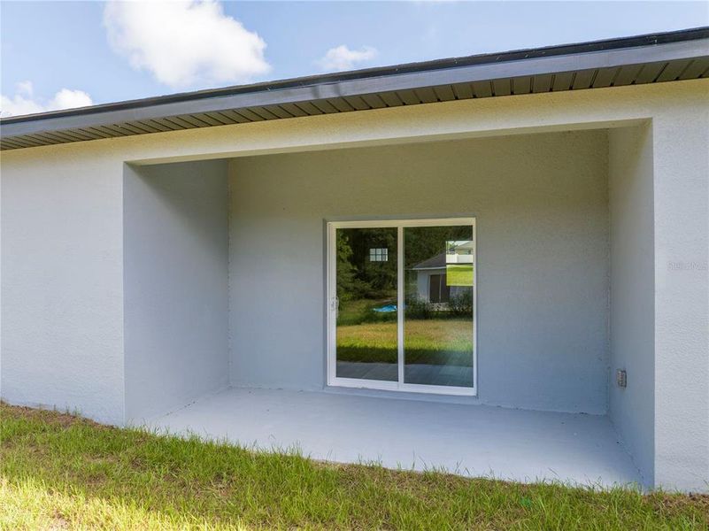 Front exterior of a new home in , Ocala, FL, highlighting curb appeal (Image 31).